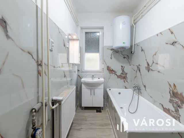 Kulcsra kész otthon a XX. ker.-ben– garázs, pince, kertrész!